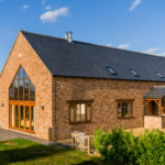 Barn Style Dwelling – adjacent to conservation area, using slate, brick and timber cladding