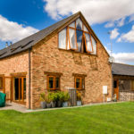 Barn Style Dwelling – adjacent to conservation area, using slate, brick and timber cladding.