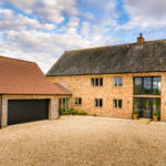 Barn Style Dwelling on farm - using slate, clay pantiles, timber cladding and brickwork in Flemish Bond.