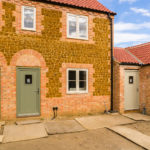 Haylett Mews - terraced houses before paving courtyard